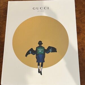 Gucci Coffee Table Book with Gold and Black Design